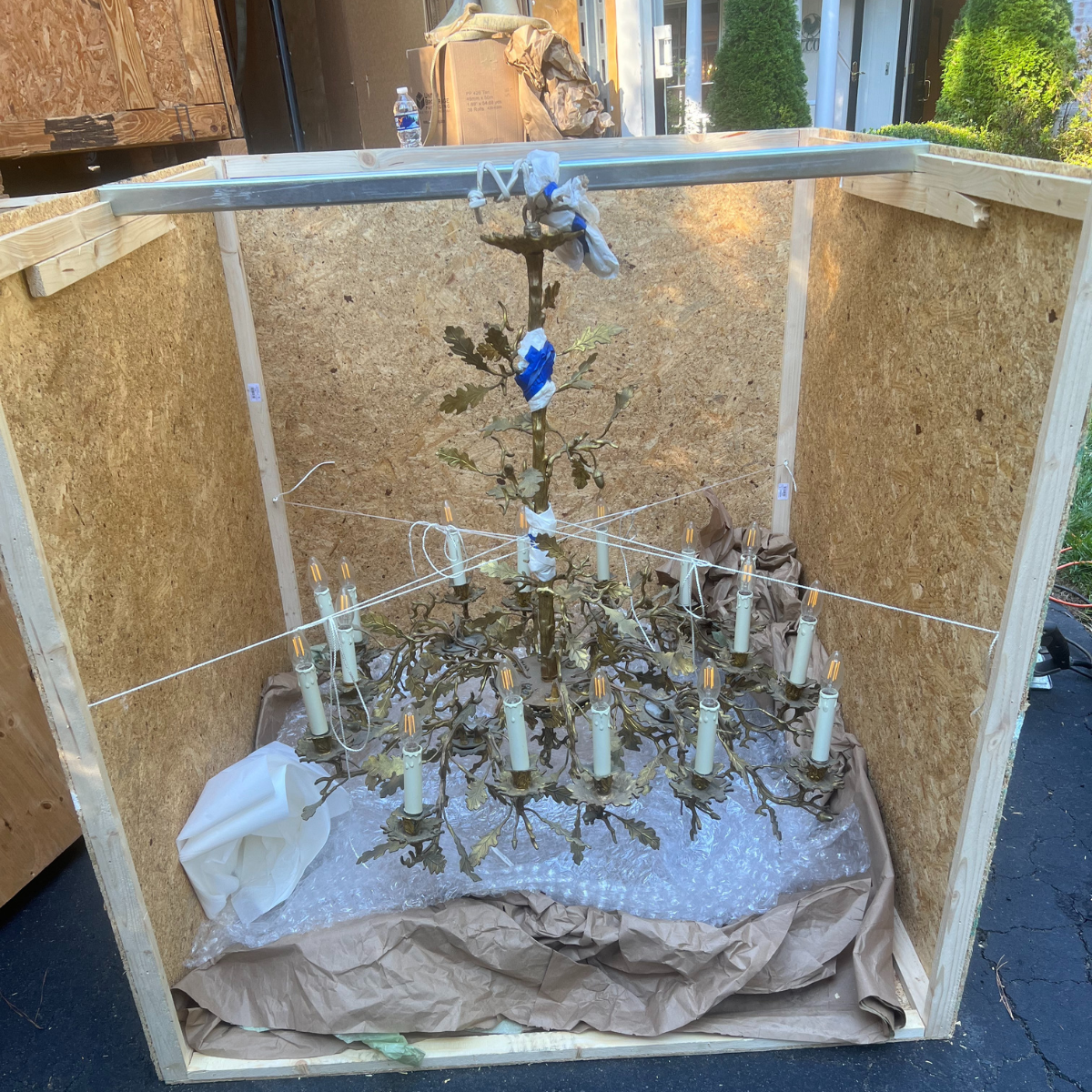 14 Large chandelier in shipping crate unpacked, ready for moving