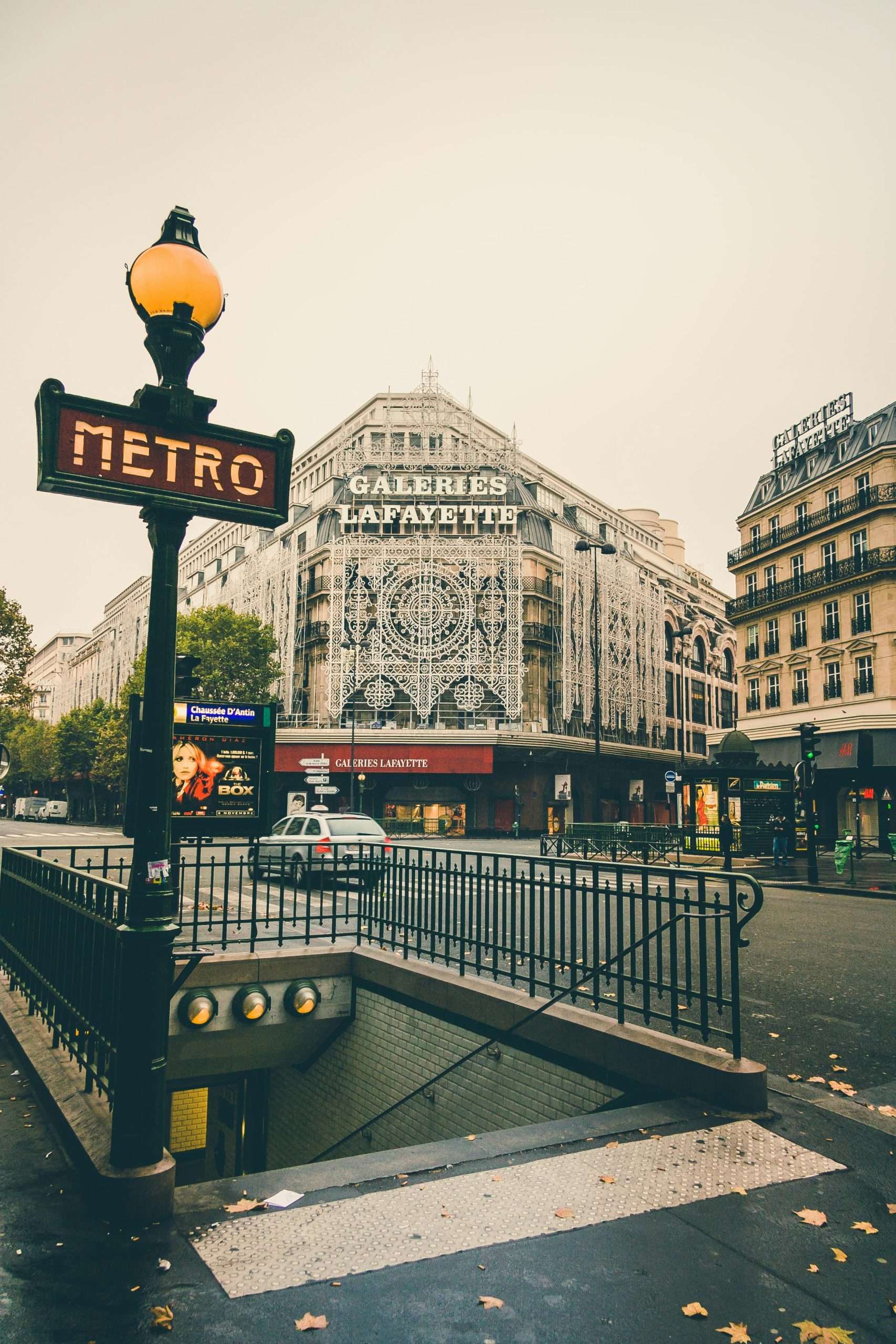 pexels-margerretta-548077 A street sign with a metro symbol stands in front of a building