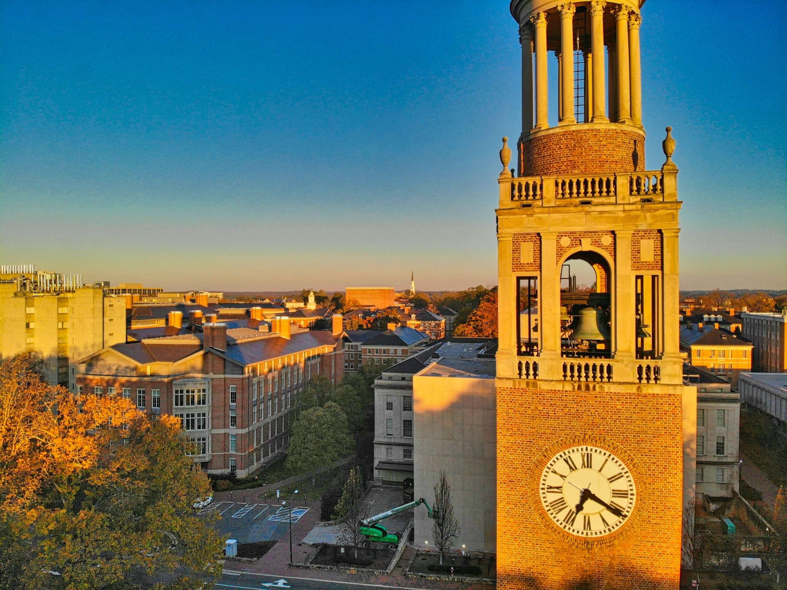 gene-gallin-fe0s2abV8R8-unsplash A tall clock tower featuring a large clock